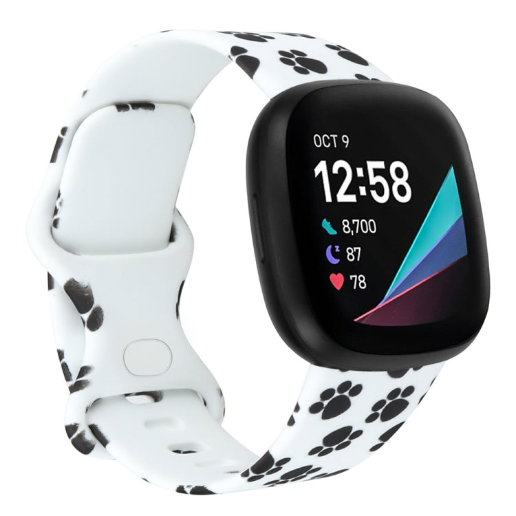 White paw-print silicone watchband strap for Fitbit Versa 3, size S; close-up on watch face