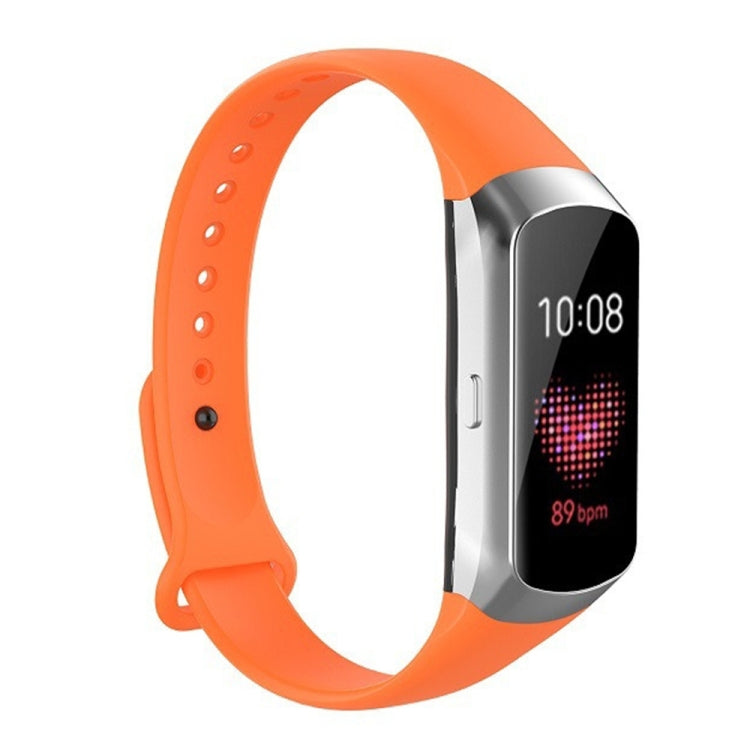 Orange silicone watch strap with glossy nail-button clasp and perforation holes