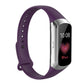 Purple silicone watch strap with glossy nail-button clasp and perforation holes