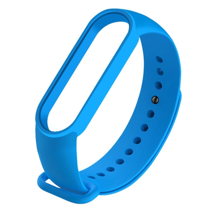 Blue silicone watch strap with multiple adjustment holes and pin buckle for Mi Band 6.