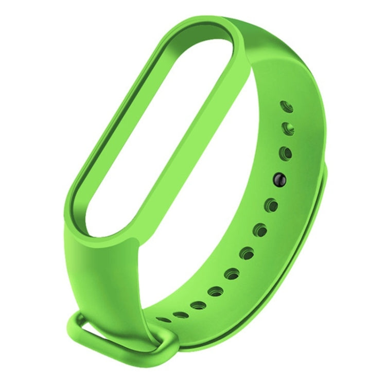 Green silicone watch strap with multiple adjustment holes and pin buckle for Mi Band 6.