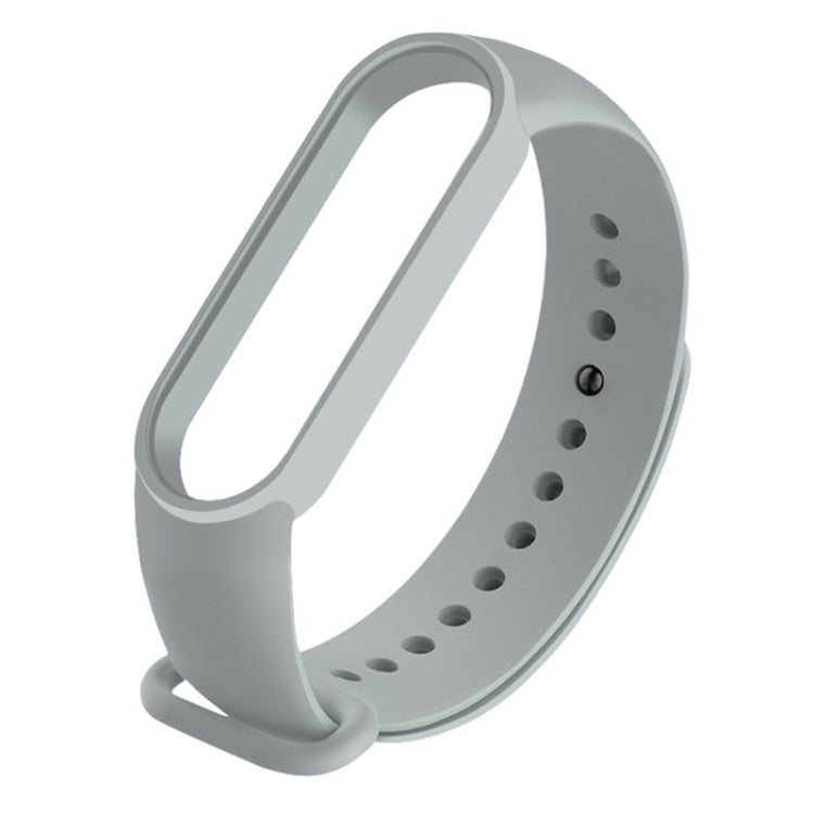 Light gray silicone watch strap with multiple adjustment holes and pin buckle for Mi Band 6.