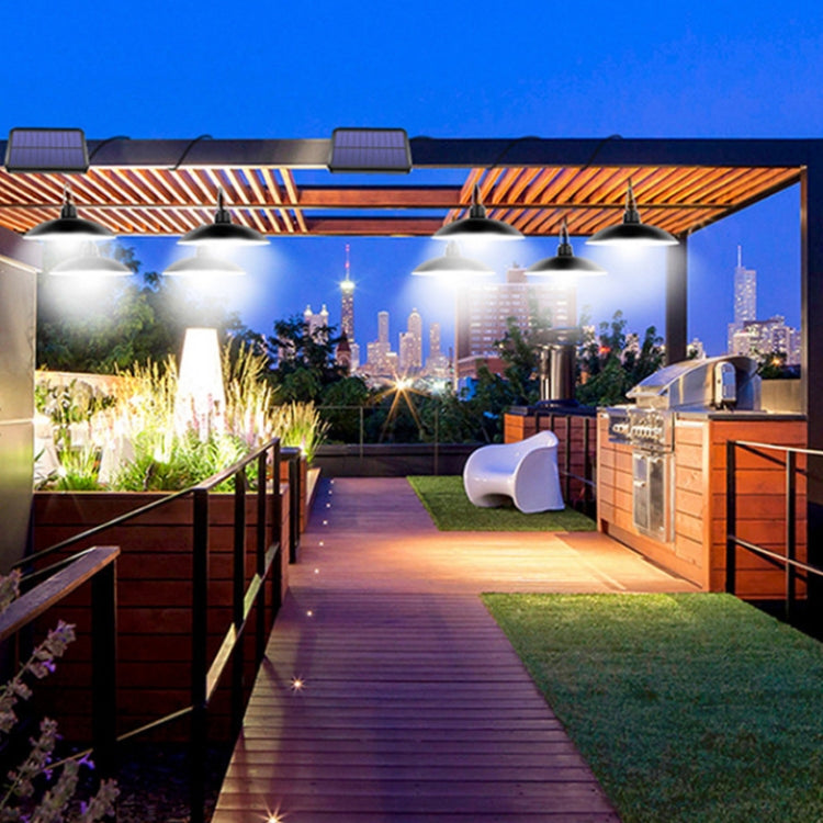 Solar landscape chandelier with multiple hanging lanterns, glowing white light