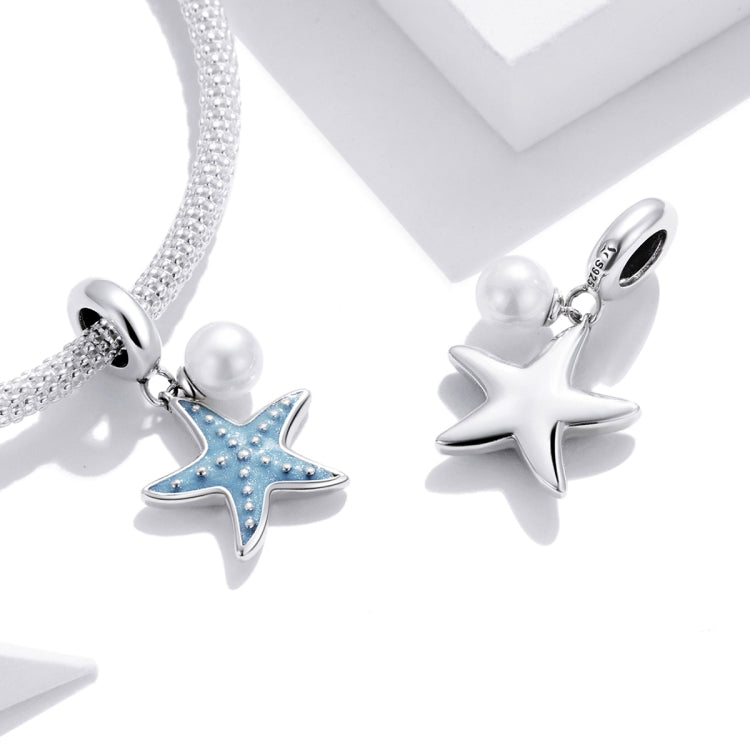 Sterling silver charm bracelet: blue starfish with pearl and a plain star charm