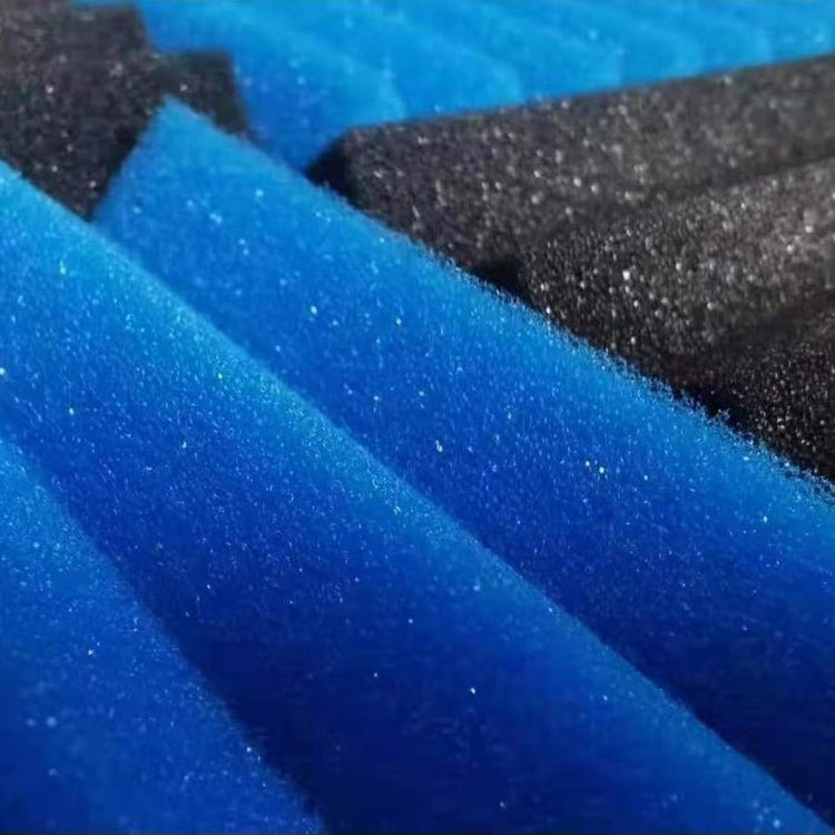 Blue triangular-groove acoustic foam sound insulation texture close-up