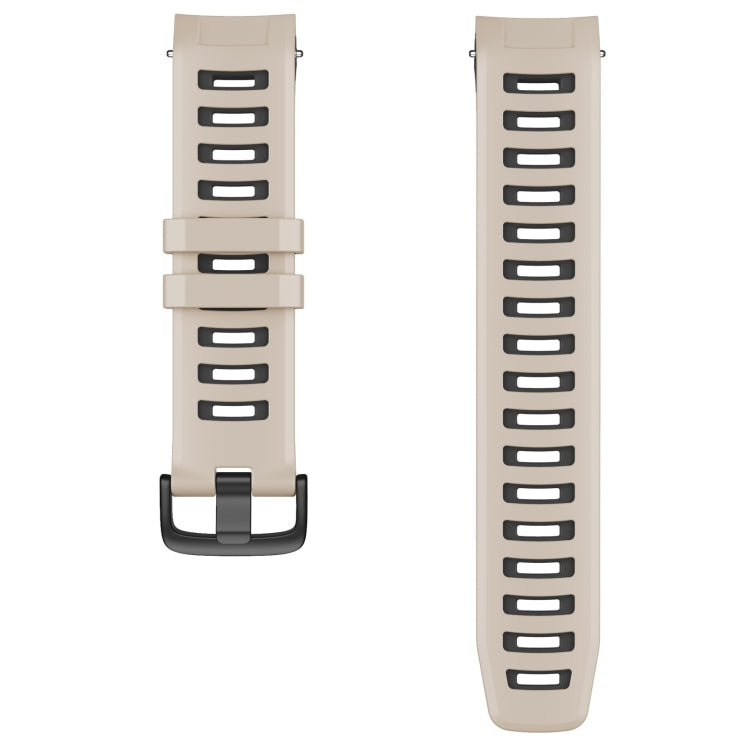 Two-tone silicone watch strap in tundra white and black, showing adjustment strap slots
