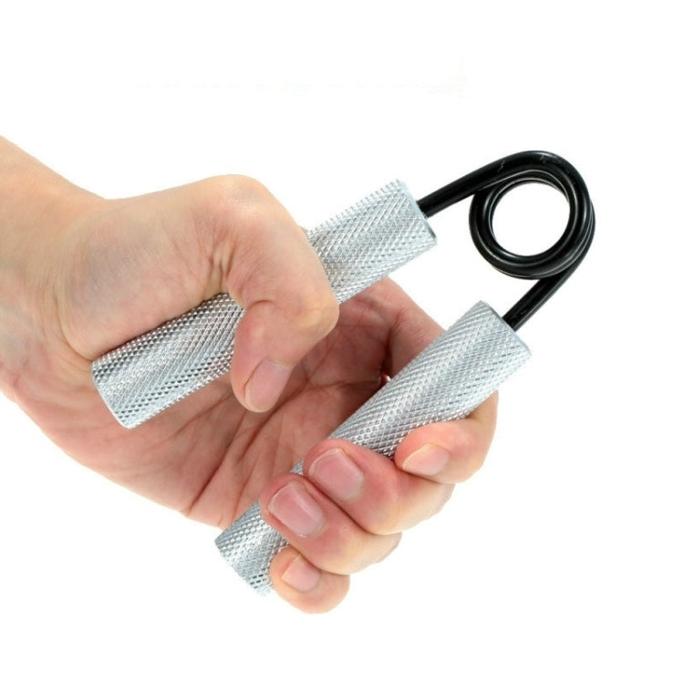 Hand using wrist strength trainer, black loop spring and silver mesh grips