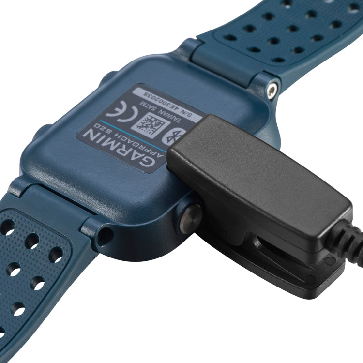 Blue smartwatch band with charging dock clip and contact pins
