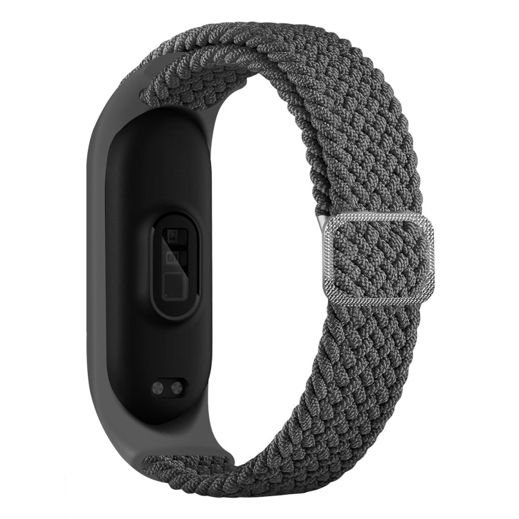 Adjustable braided elastic watchband with gray strap and clasp for fitness tracker