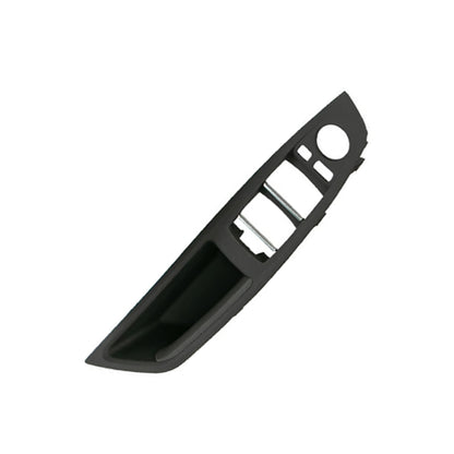 Black left front inner door armrest panel with window switch cutout and handle recess