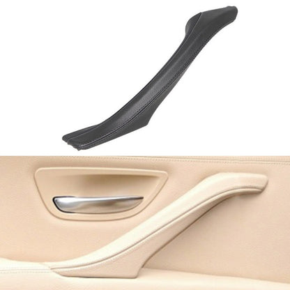 Black left inner door handle trim assembly, curved leather-look insert with stitching