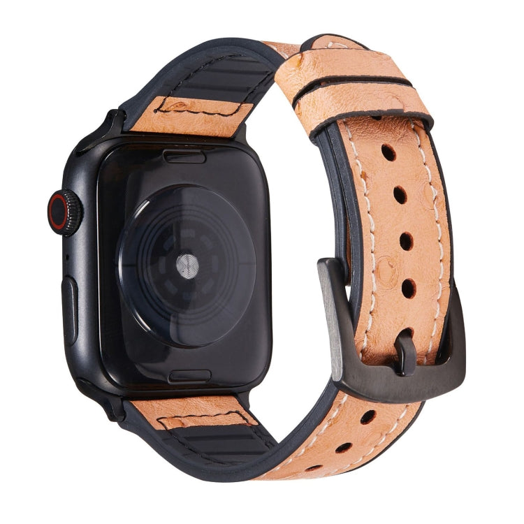 Tan ostrich-texture leather watch band with metal clasp and pin holes