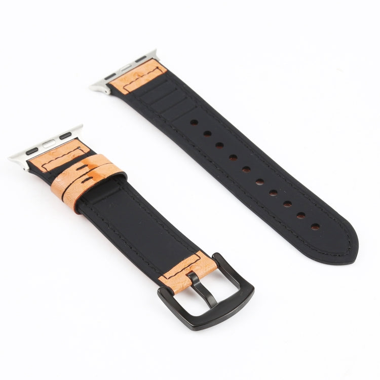 Black leather watch band with tan underside, metal buckle clasp, pin holes