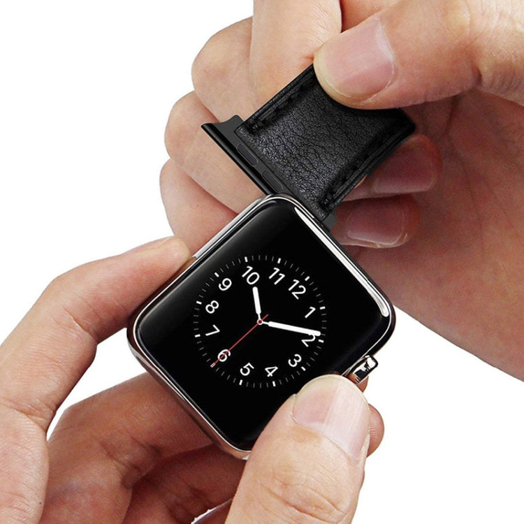 Black watch strap with stainless steel connector installed on a square smartwatch