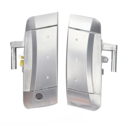 Pair of silver car front door outside handles with key cylinder cutouts and mounting brackets