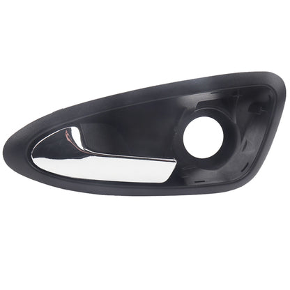 Left side interior door handle with black bezel and chrome lever insert