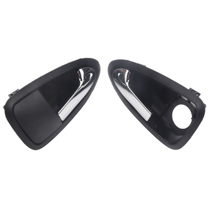 Pair of black car interior door handles with chrome-look lever inserts