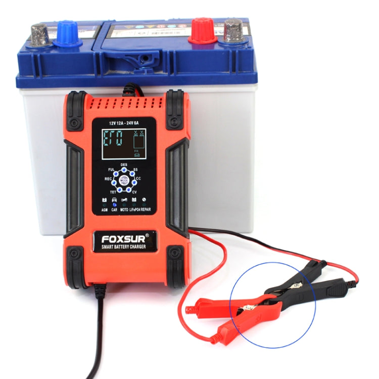 Battery charger with red cable and black clamp leads for connecting to a lead-acid battery.