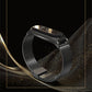 Black Milanese-style watch band with metal clasp and black smartwatch