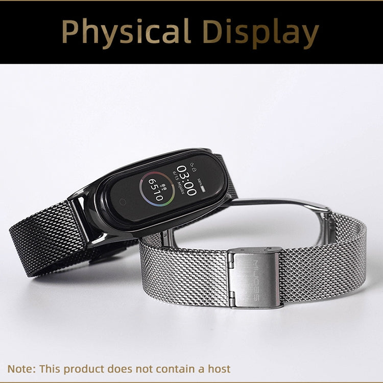 Silver stainless steel watch band with metal clasp and smartwatch showing time