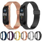Milanese watch bands set with rose gold and black bands, plus multiple colors