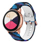 Blue patterned silicone watch band with rose-gold clasp and white perforated underside
