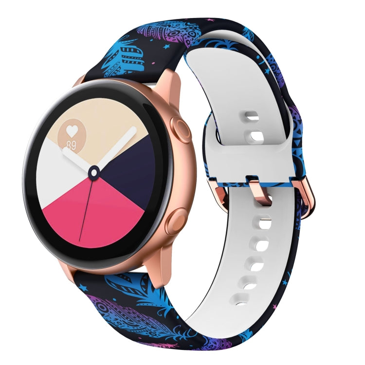 Blue patterned silicone watch band with rose-gold clasp and white perforated underside