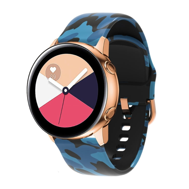 Silicone watchband with blue camouflage print and perforated strap for Galaxy Watch.