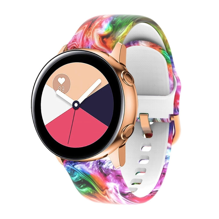 Silicone watchband with colorful marbled print and perforated strap for Galaxy Watch.