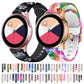 Two silicone watch bands: black floral and rainbow swirl, shown together