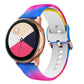 Blue, pink, and yellow gradient silicone watch band with rose-gold clasp