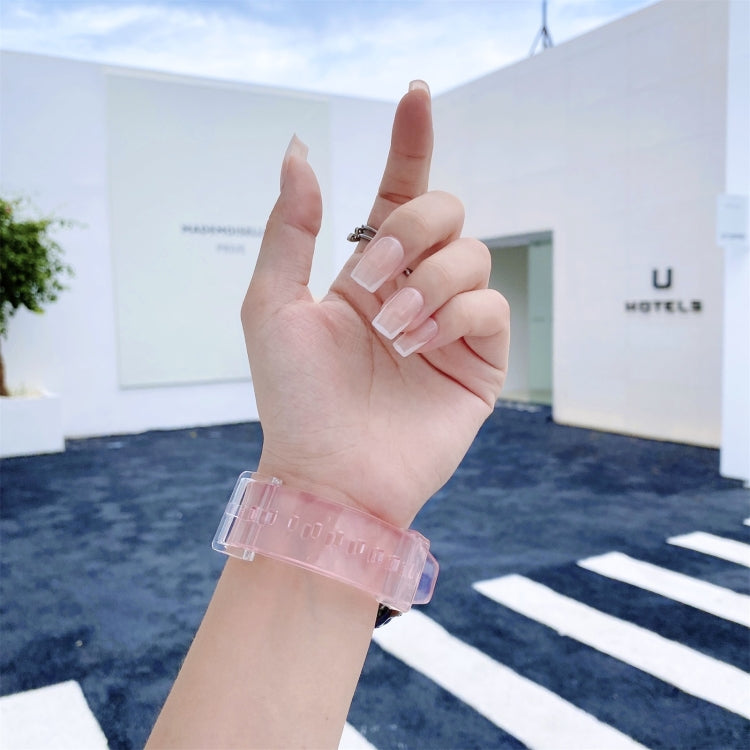 Light pink 22mm silicone smartwatch replacement strap worn on wrist with clear clasp