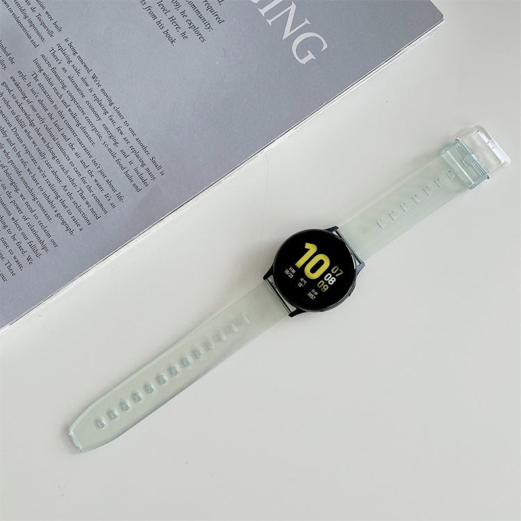 22mm light blue-green silicone smartwatch replacement strap with clear clasp and black watch