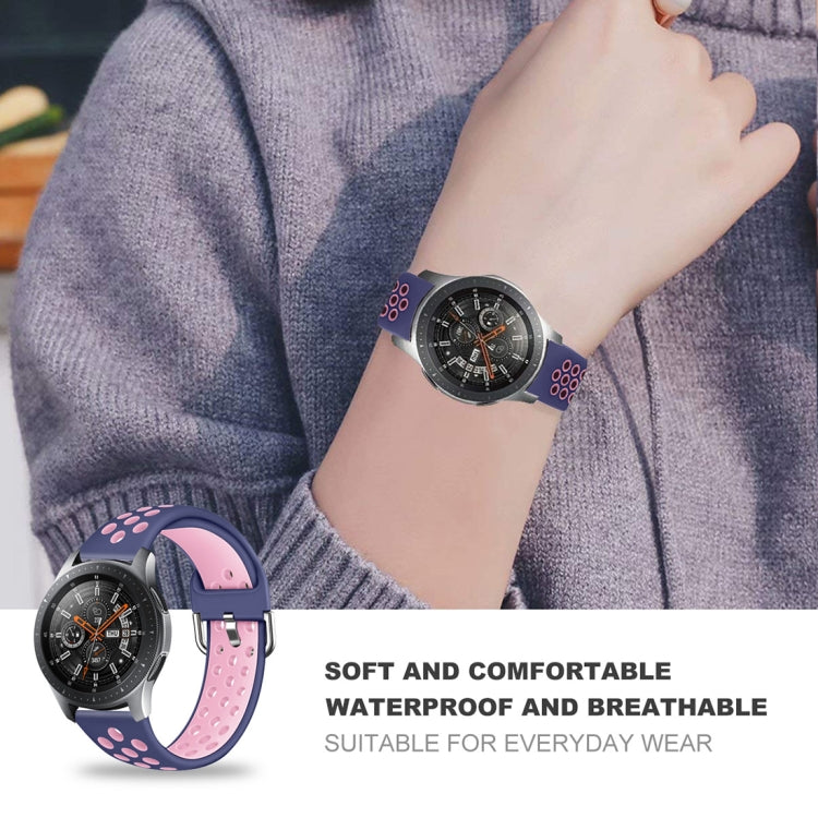 Pink perforated silicone watch strap with metal buckle on wrist
