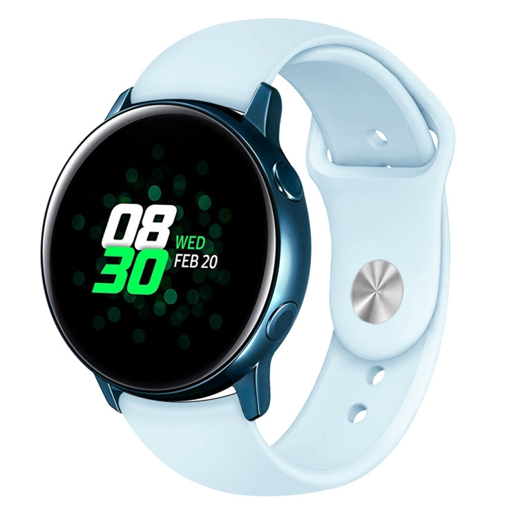 Silicone smartwatch wrist strap in light blue with metal clasp and perforations