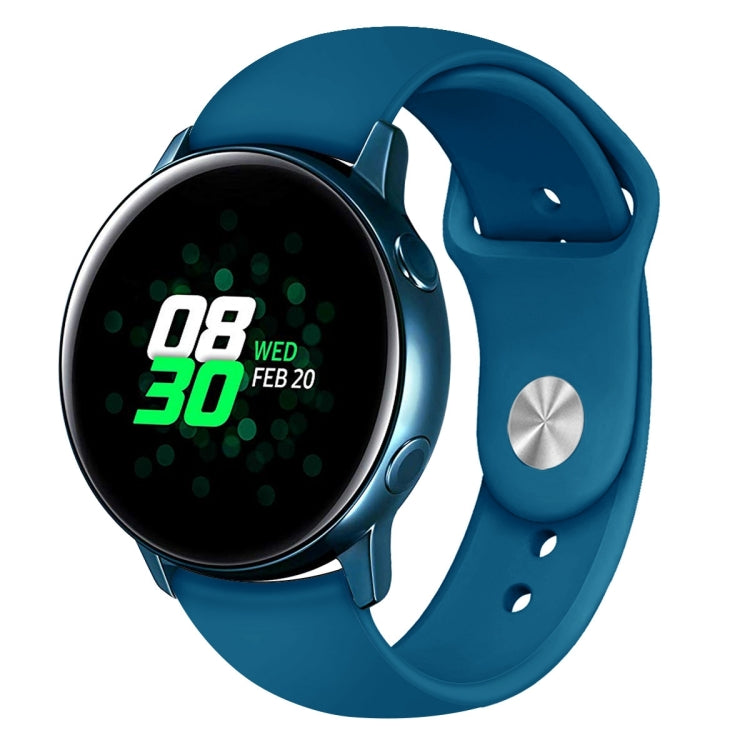 Silicone smartwatch wrist strap in blue with metal clasp and perforations