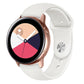 Cream-white silicone smartwatch band with metal clasp plate and buckle holes