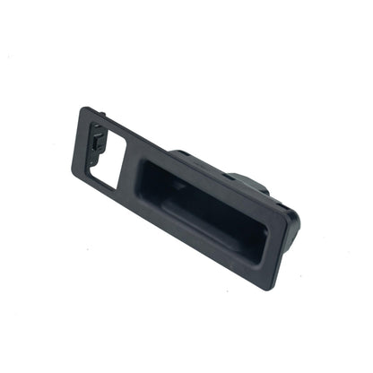 Car tailgate switch housing, dark plastic, rectangular opening with mounting bracket