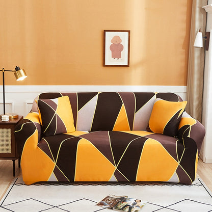 Geometric sofa cover in black, yellow, and cream with matching seat and back arms.
