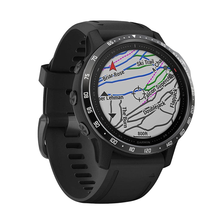 Smartwatch bezel ring accessory on a black watch with white and colored track markings