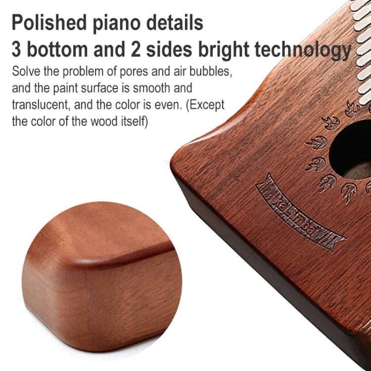 Wooden 17-tone kalimba close-up with metal tines and round sound hole