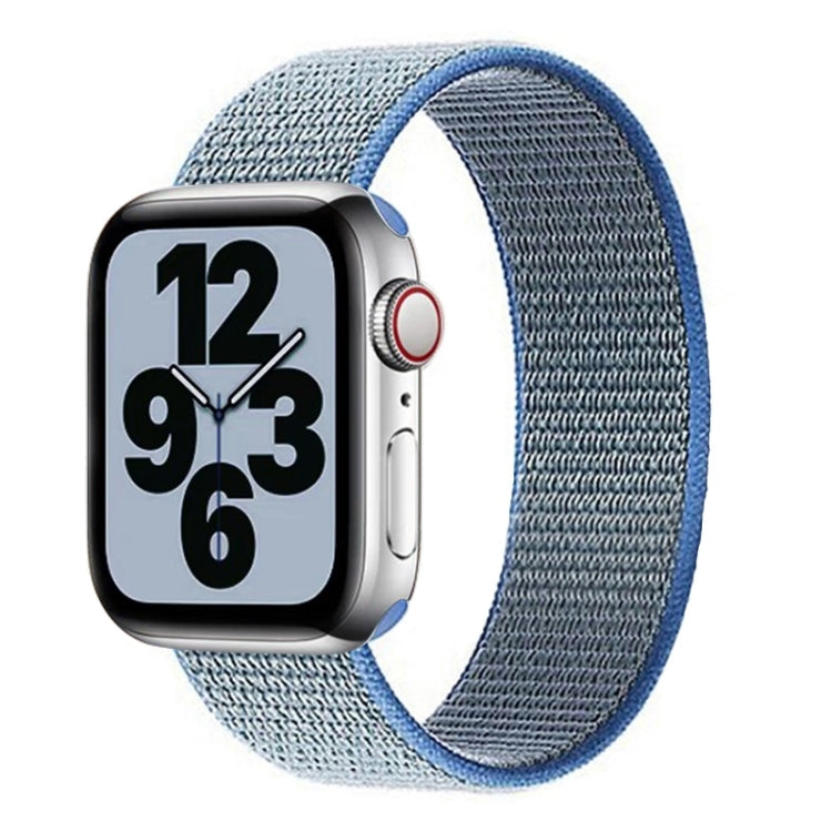 Light blue nylon woven replacement watchband with adjustable clasp and connector ends.
