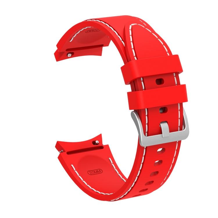 Red silicone watch strap with stitched edges and metal clasp buckle