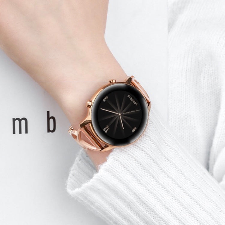 Rose gold heart-link watchband bracelet with round black smartwatch face.