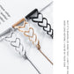 Heart-link watchband bracelet set in black, rose gold, and silver with dangling beads.
