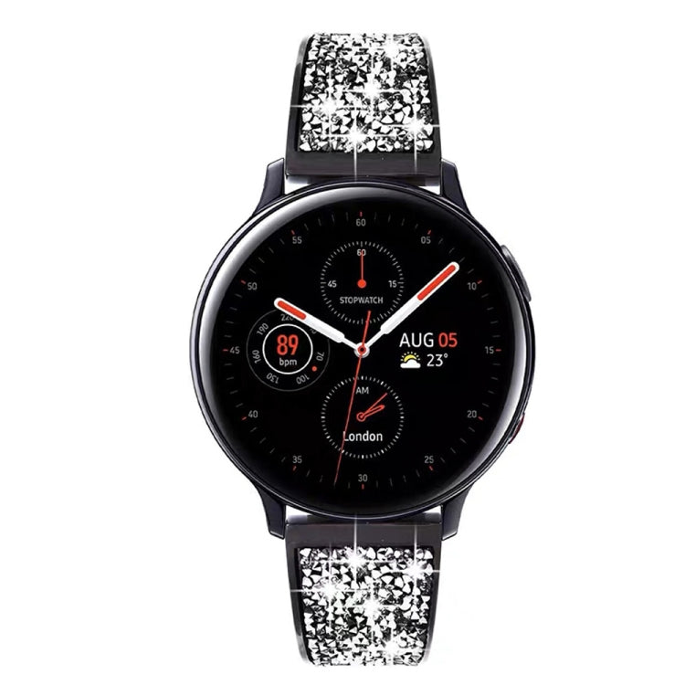 Silver sparkling stainless steel watchband on a smartwatch with black display