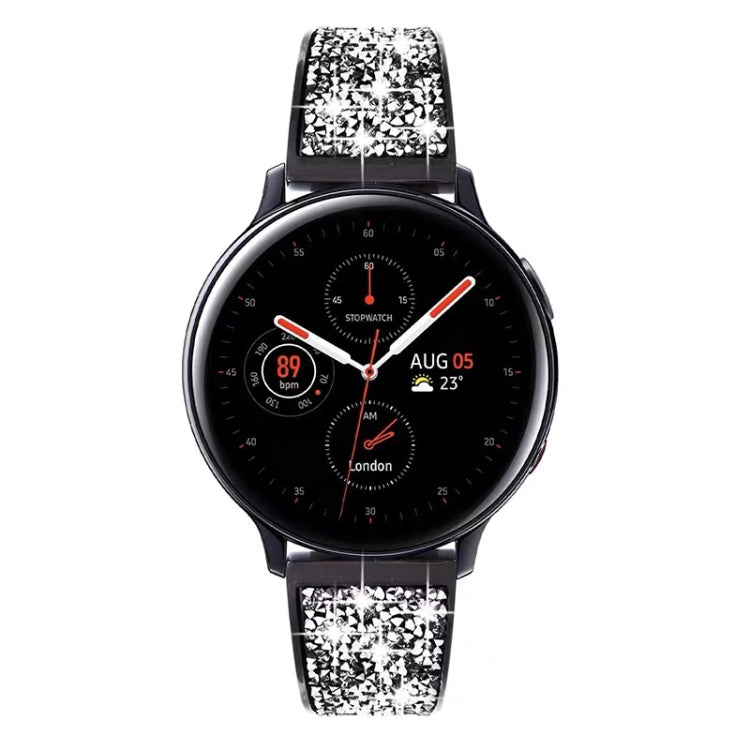 Black smartwatch with crystal-pattern metal watch band and rounded strap links