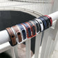 Assorted TPU and leather-look watchbands with perforated holes in multiple colors