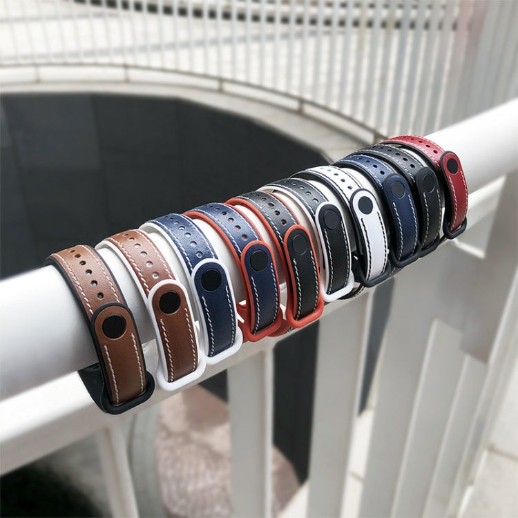 Assorted TPU and leather-look watchbands with perforated holes in multiple colors