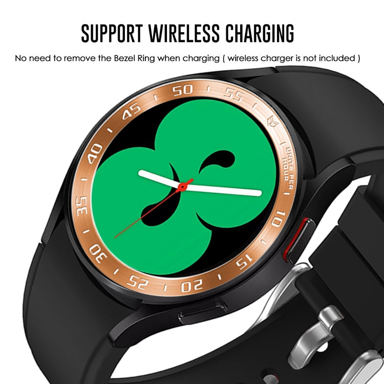 Gold smartwatch bezel ring with engraved minute track and raised edge around display